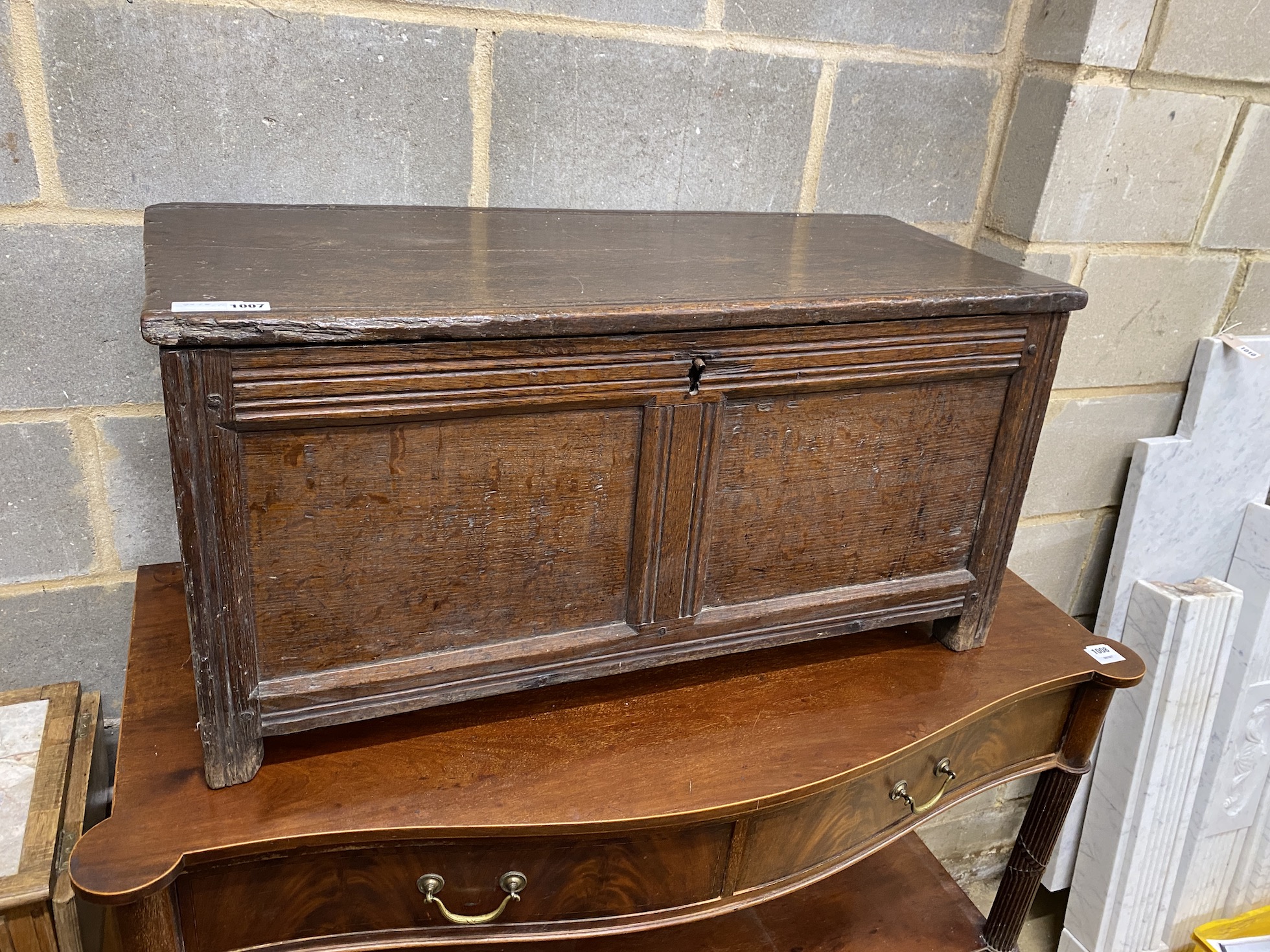 A late 17th century French panelled oak small coffer, width 93cm, depth 39cm, height 46cm
